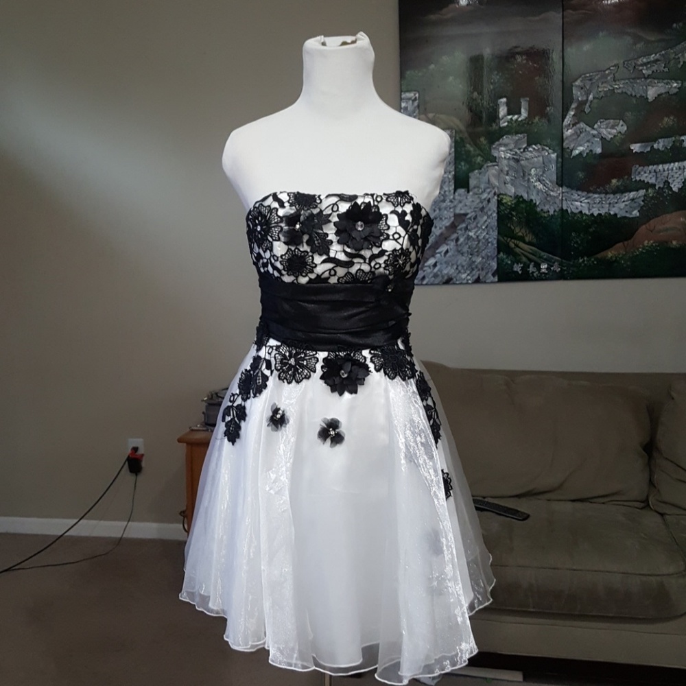 Black and white shimmer mini dress.